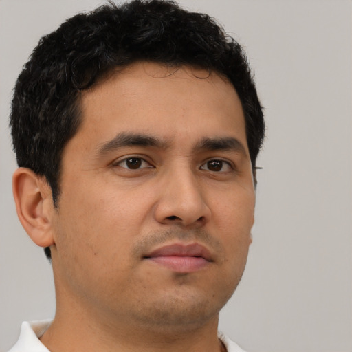 Neutral latino young-adult male with short  brown hair and brown eyes