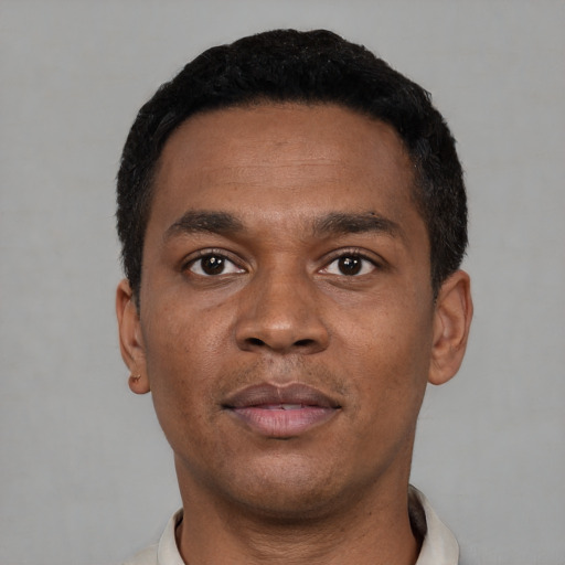 Neutral black young-adult male with short  black hair and brown eyes
