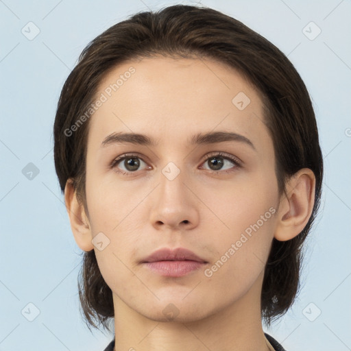 Neutral white young-adult female with medium  brown hair and brown eyes