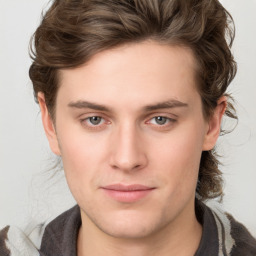 Joyful white young-adult male with medium  brown hair and brown eyes