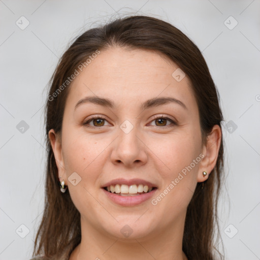 Joyful white young-adult female with medium  brown hair and grey eyes