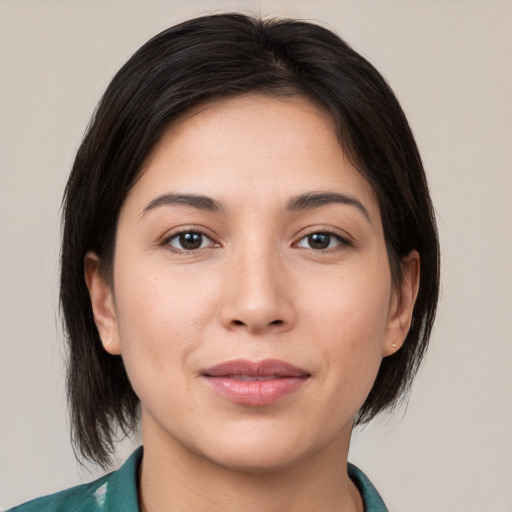 Joyful white young-adult female with medium  brown hair and brown eyes