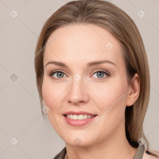 Joyful white young-adult female with medium  brown hair and grey eyes