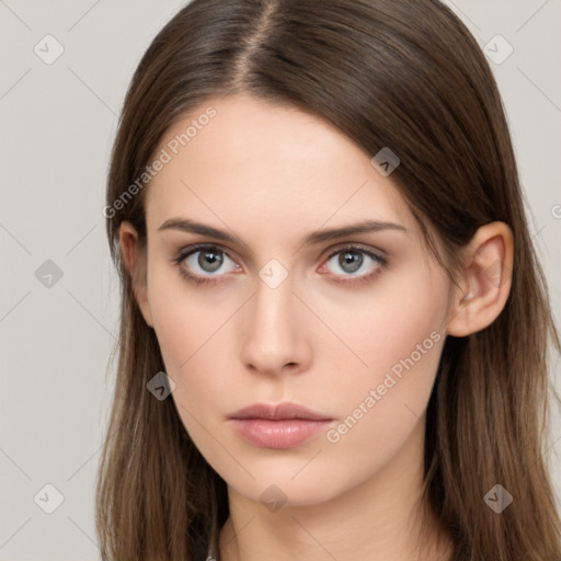 Neutral white young-adult female with long  brown hair and brown eyes