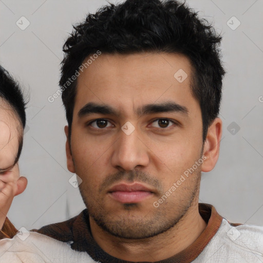 Neutral latino young-adult male with short  black hair and brown eyes