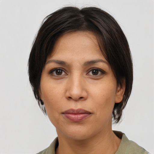Neutral white young-adult female with medium  brown hair and brown eyes