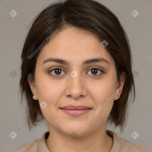 Joyful white young-adult female with medium  brown hair and brown eyes