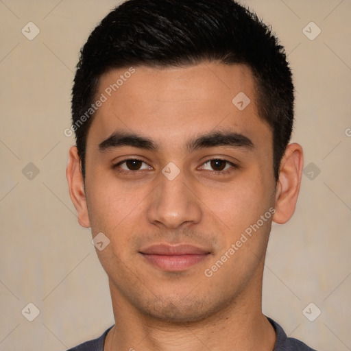 Joyful white young-adult male with short  black hair and brown eyes