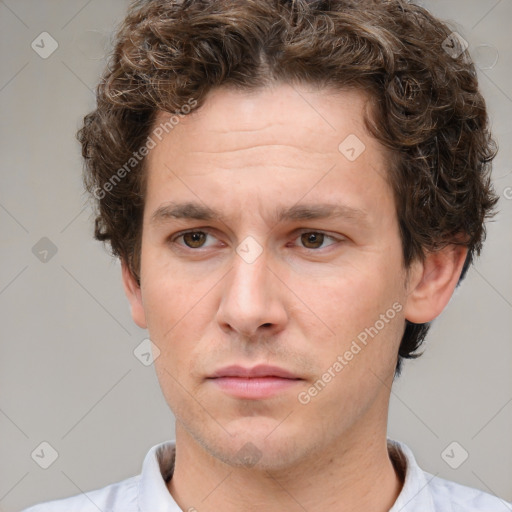 Neutral white young-adult male with short  brown hair and grey eyes