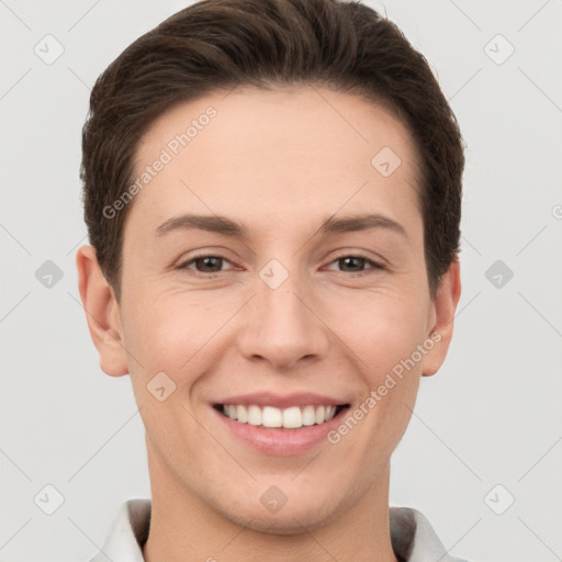 Joyful white young-adult female with short  brown hair and brown eyes