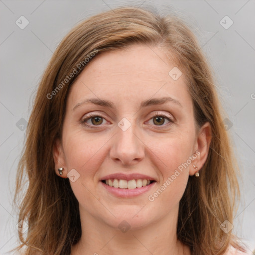 Joyful white young-adult female with long  brown hair and grey eyes