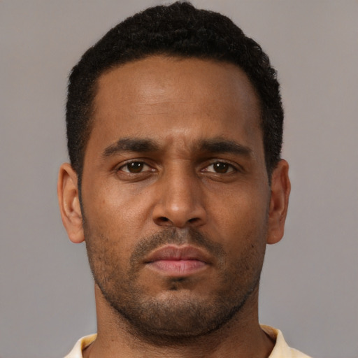 Neutral black young-adult male with short  brown hair and brown eyes