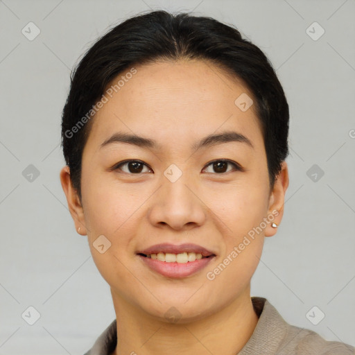 Joyful asian young-adult female with short  brown hair and brown eyes