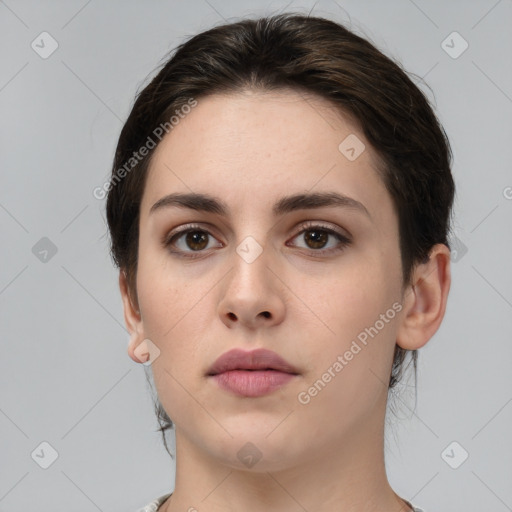 Neutral white young-adult female with medium  brown hair and brown eyes