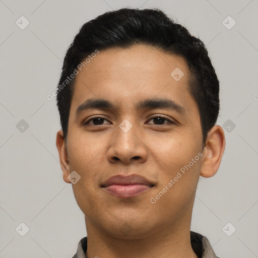 Joyful asian young-adult male with short  black hair and brown eyes