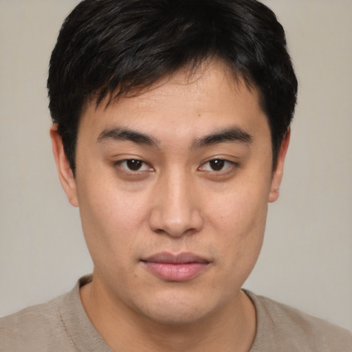 Neutral asian young-adult male with short  brown hair and brown eyes