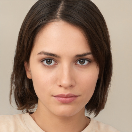 Neutral white young-adult female with medium  brown hair and brown eyes