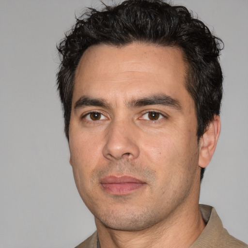 Neutral white adult male with short  black hair and brown eyes