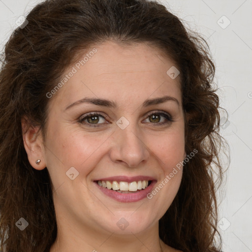 Joyful white young-adult female with long  brown hair and green eyes