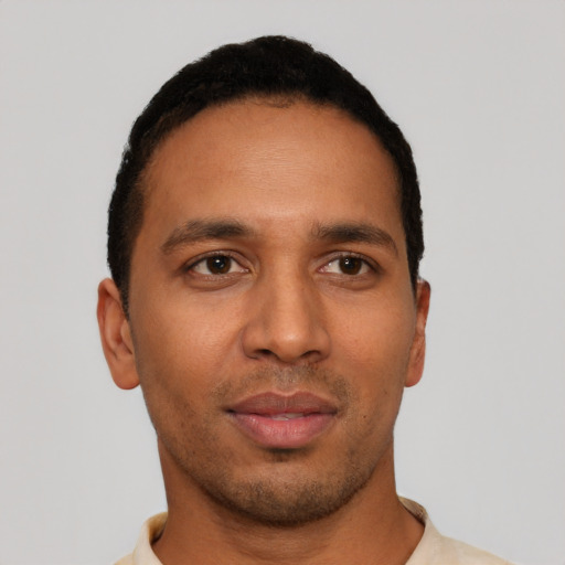 Neutral latino young-adult male with short  brown hair and brown eyes