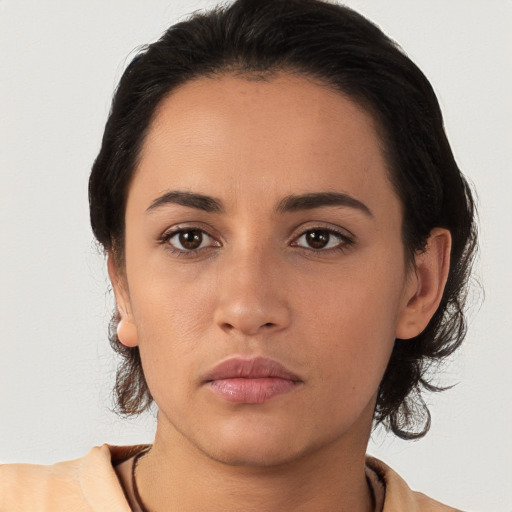 Neutral white young-adult female with medium  brown hair and brown eyes