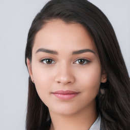 Joyful white young-adult female with long  black hair and brown eyes