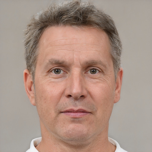 Neutral white middle-aged male with short  brown hair and brown eyes