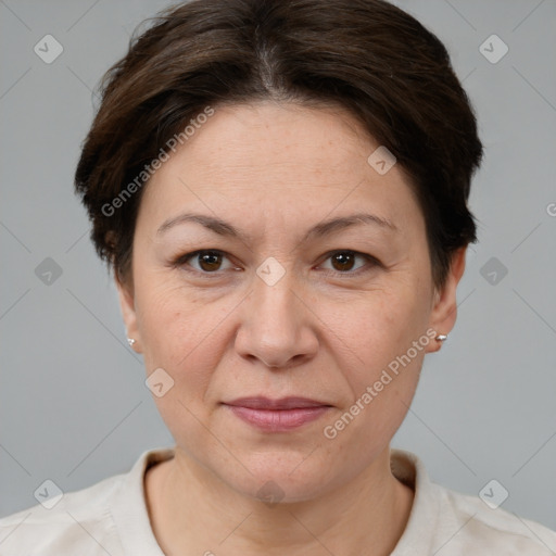 Joyful white adult female with short  brown hair and brown eyes