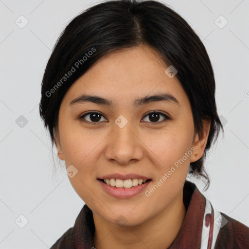 Joyful asian young-adult female with medium  brown hair and brown eyes