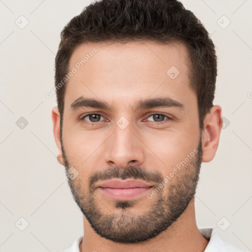 Neutral white young-adult male with short  brown hair and brown eyes