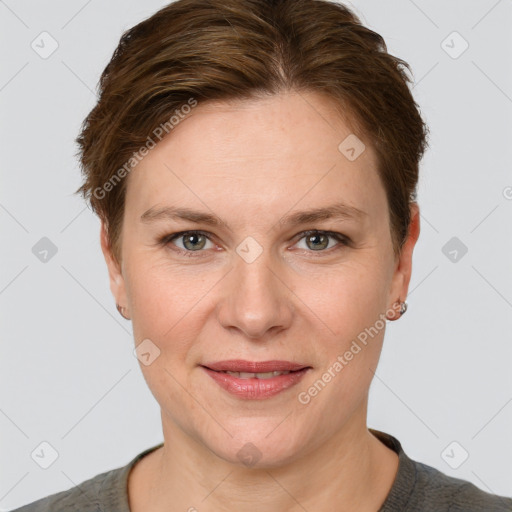 Joyful white young-adult female with short  brown hair and grey eyes