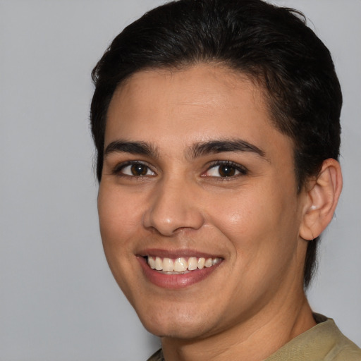 Joyful white young-adult female with short  brown hair and brown eyes