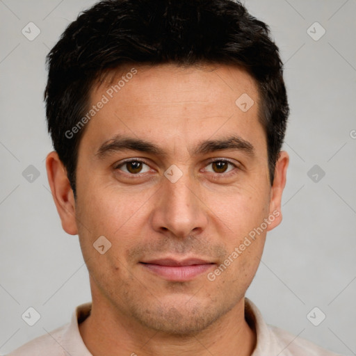 Joyful white adult male with short  brown hair and brown eyes