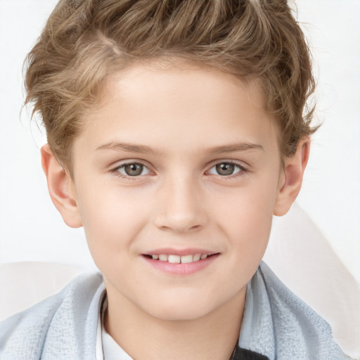 Joyful white child male with short  brown hair and brown eyes