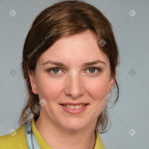 Joyful white young-adult female with medium  brown hair and blue eyes