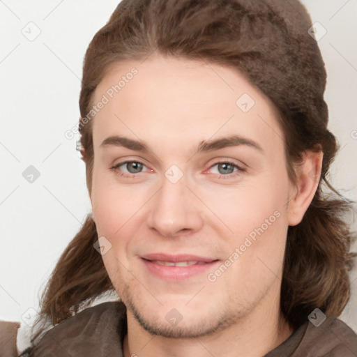 Joyful white young-adult female with long  brown hair and grey eyes