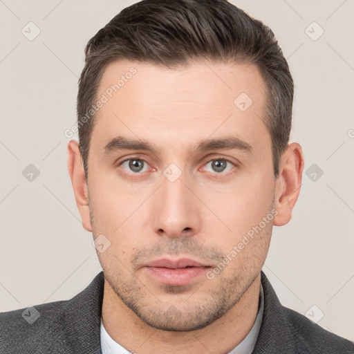 Neutral white young-adult male with short  brown hair and brown eyes