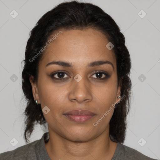 Joyful black young-adult female with medium  brown hair and brown eyes