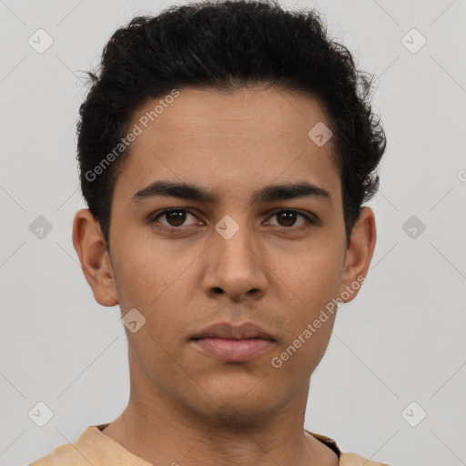 Neutral latino young-adult male with short  black hair and brown eyes