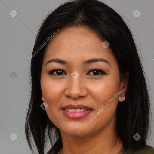 Joyful asian young-adult female with long  brown hair and brown eyes