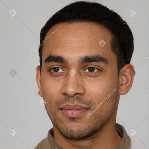 Neutral latino young-adult male with short  black hair and brown eyes