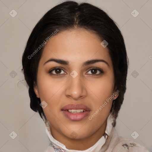 Joyful latino young-adult female with medium  brown hair and brown eyes