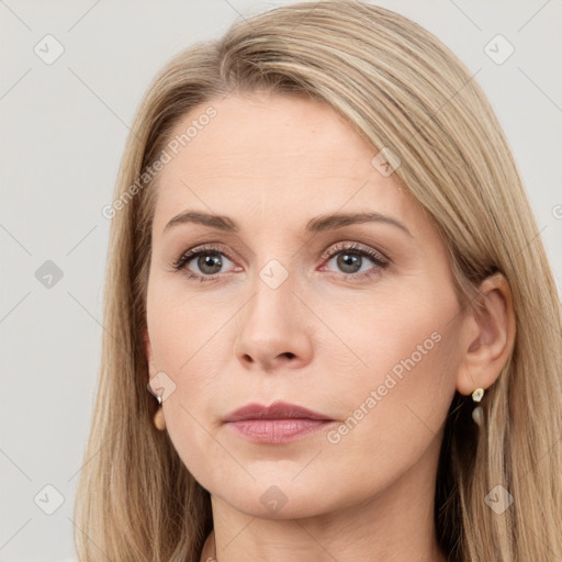 Neutral white young-adult female with long  brown hair and brown eyes