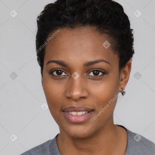 Joyful black young-adult female with short  black hair and brown eyes