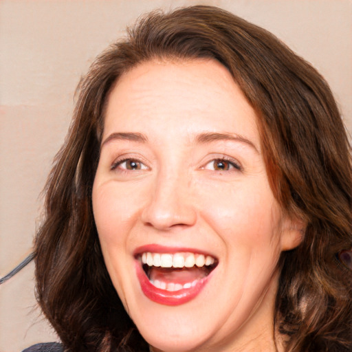 Joyful white adult female with long  brown hair and brown eyes