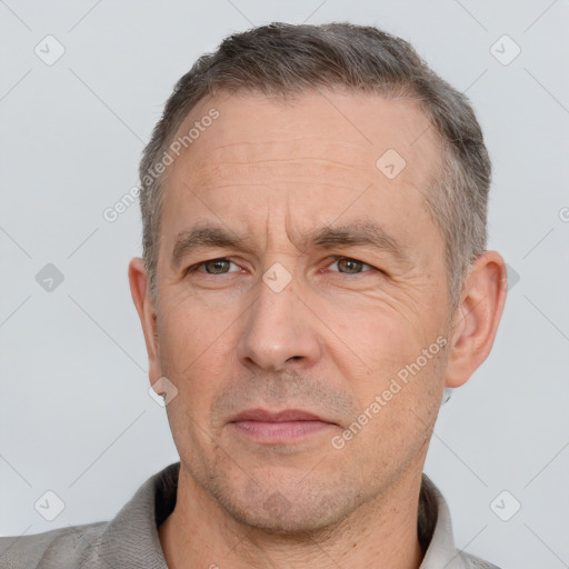 Neutral white adult male with short  brown hair and brown eyes