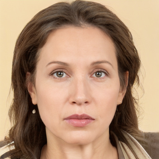 Neutral white adult female with long  brown hair and brown eyes