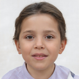 Joyful white child female with short  brown hair and brown eyes