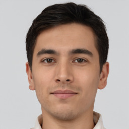 Neutral asian young-adult male with short  black hair and brown eyes