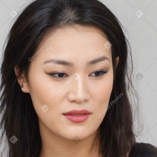 Joyful asian young-adult female with long  brown hair and brown eyes